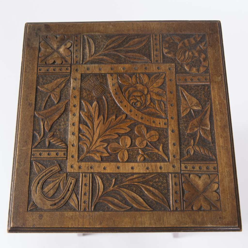 Carved Aesthetic Movement table by Shoolbred