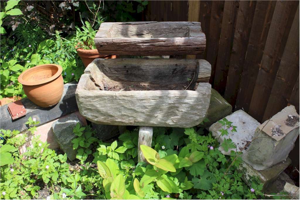 Two teak garden planters