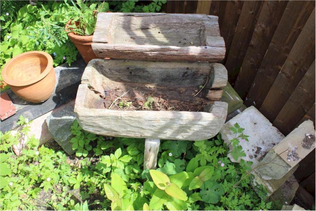 Two teak garden planters