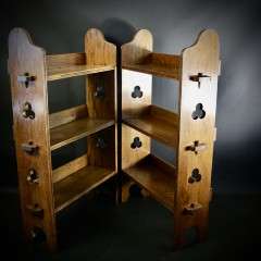 A Pair of Arts and Crafts oak open bookshelves, 