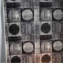 Vintage unused roll of cotton fabric with black and white geometric square and circles