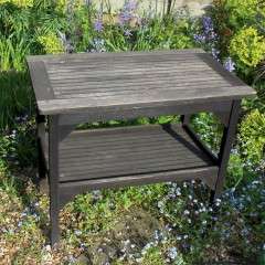 Teak garden table by Hughes Bolckow