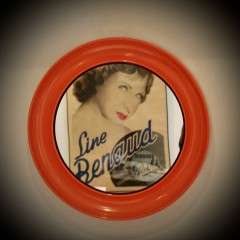 Vintage 1970's Orange round plastic mirror