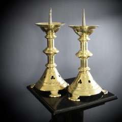 A Pair of Gothic Brass candlesticks