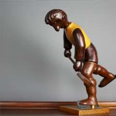 Italian mid-century Romer vintage carved figure of an ice hockey player