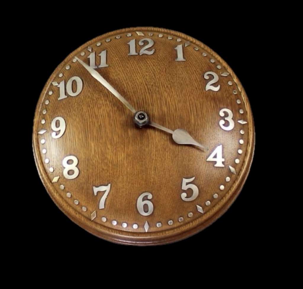 1930's Zenith for Heals oak domed wall clock.